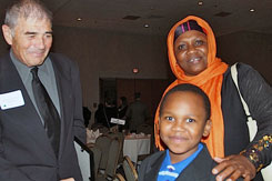 Robert Forster with an RCSD student and his mother